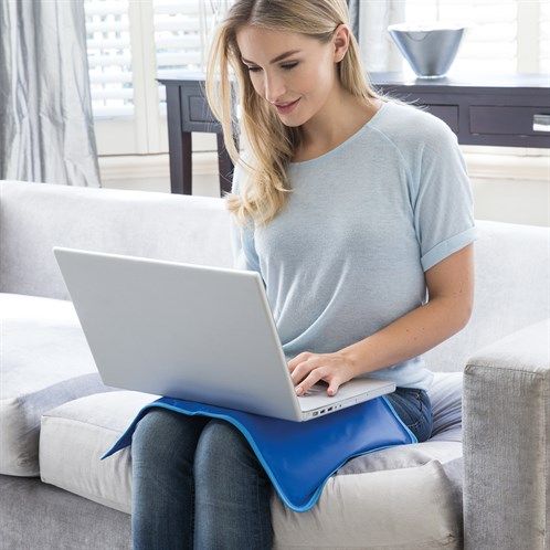 Lady using the Chillmax as a laptop cooling mat